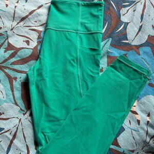 Athleta Salutation Stash Pocket Tigh Legging in Teal Size Medium